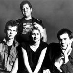 Blood On The Saddle - Hully Gully Rehearsal Studios - Los Angeles, California- (1985) Standing: Herman Senac (Drums) - Sitting Left to Right: Ron Botelho (Bass), Annette Zilinskas (Lead Vocals, Rhythm Guitar, Harmonica), Greg Davis (Lead Vocals, Guitar)
