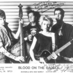 Blood on the Saddle (1983) Left to Right - Ron Botelho: Upright Bass Hermann Senac: Drums/Vocals - Annette Zilinskas: Vocals/Guitar - Greg Davis: Guitar/Vocals